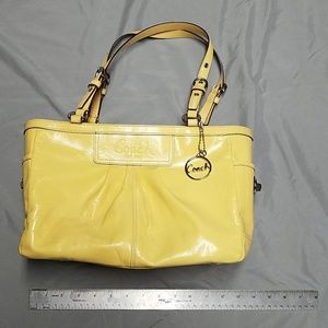 Coach patent leather yellow handbag